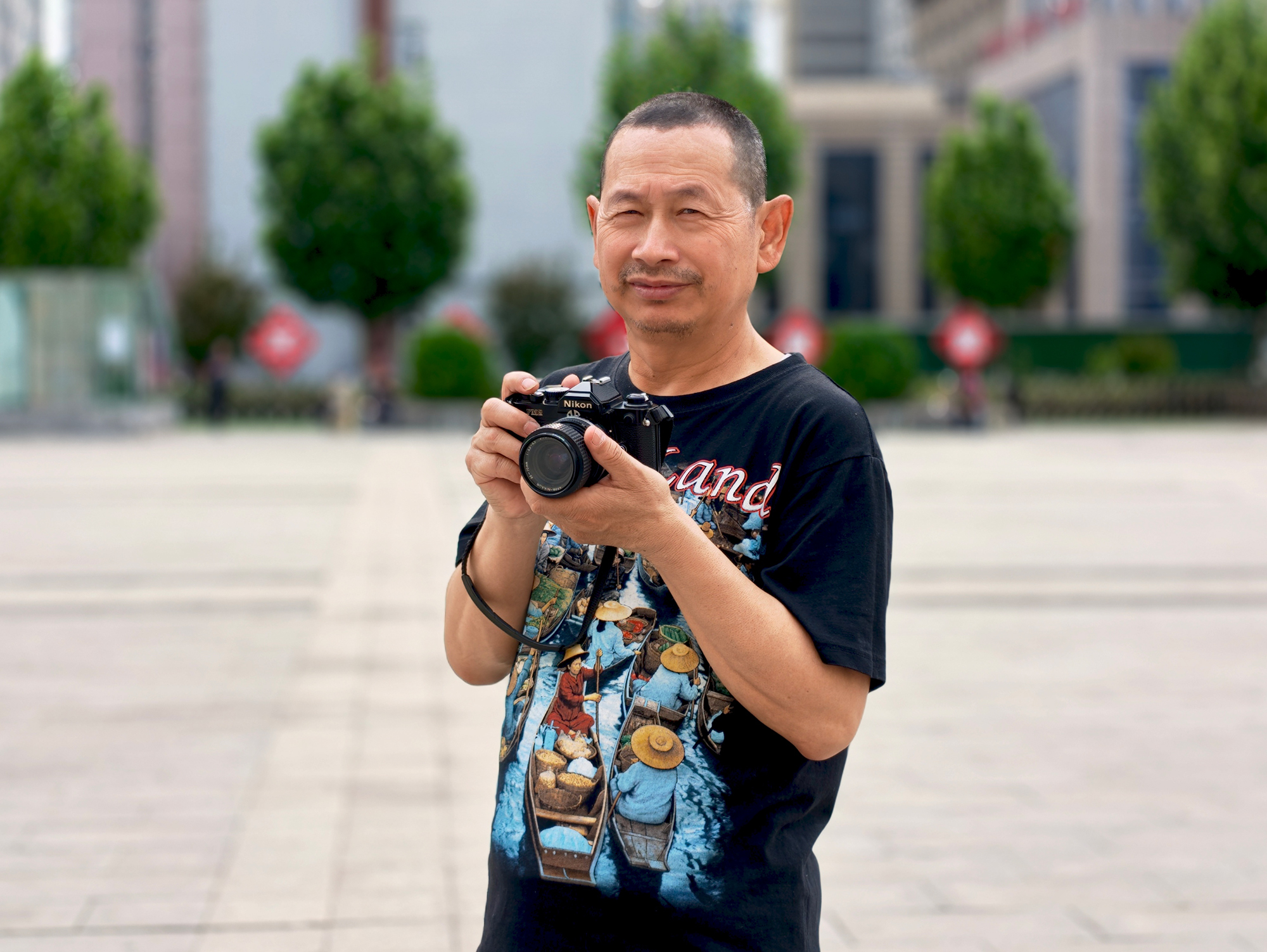 听障摄影师张平。